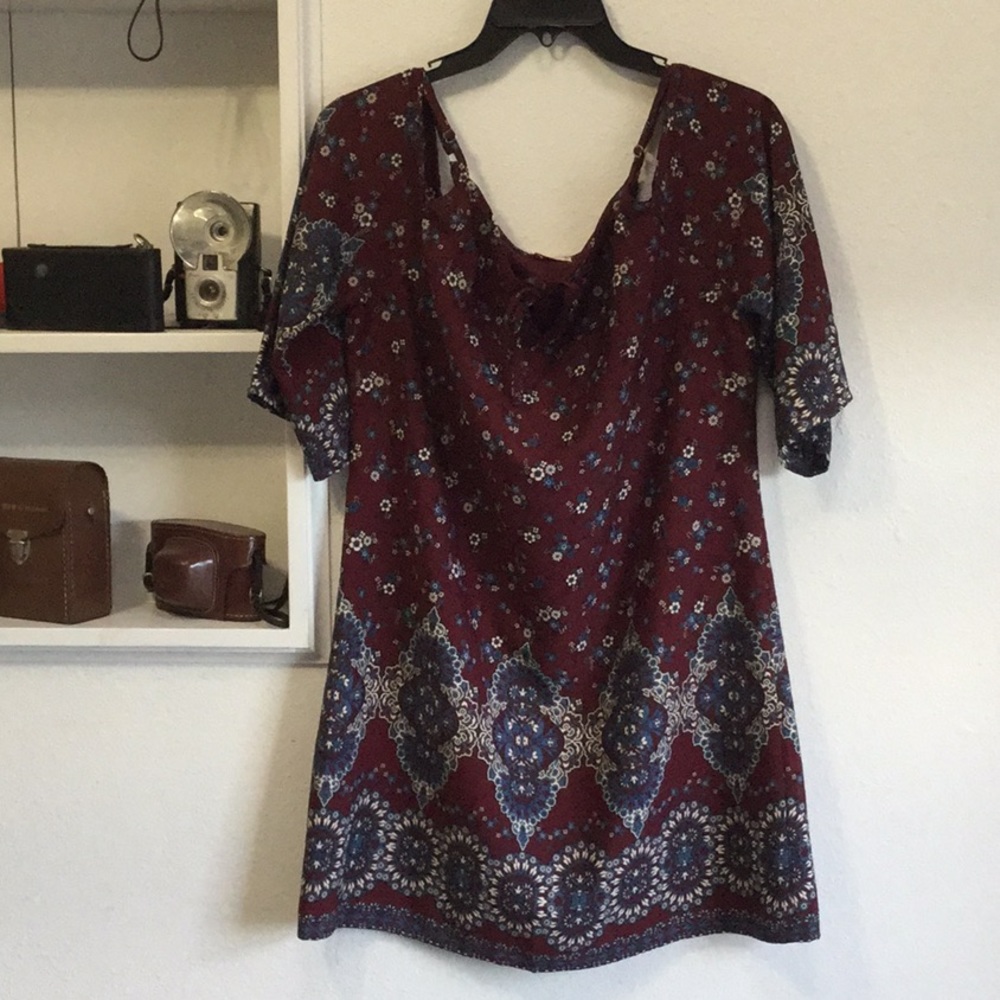 A maroon dress with floral design💚